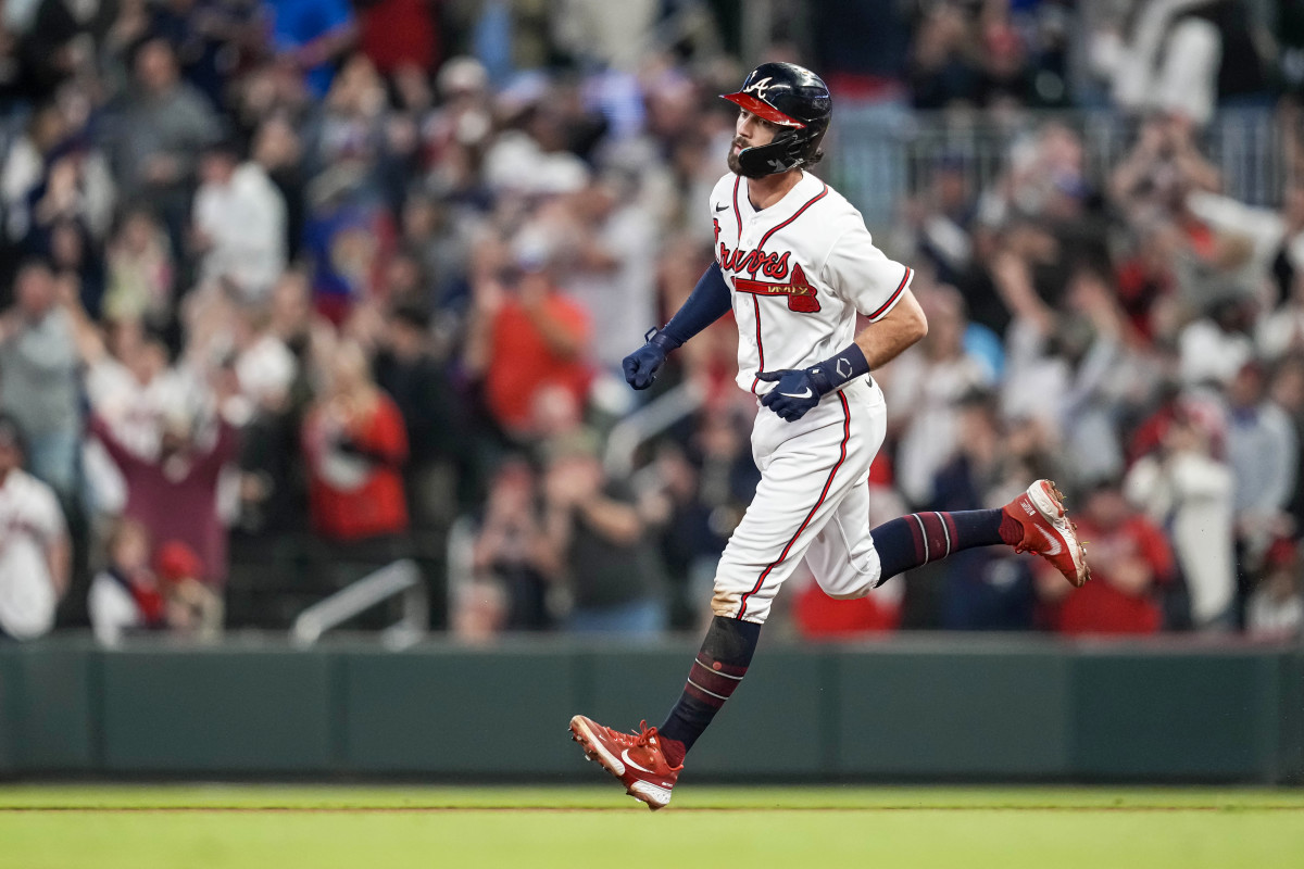 Braves shortstop Dansby Swanson runs the bases after hitting a home run.